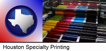 an offset printing press with CMYK ink rollers in Houston, TX