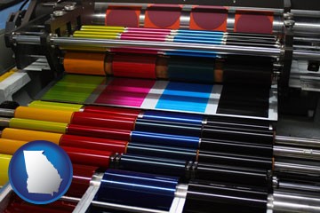 an offset printing press with CMYK ink rollers - with Georgia icon