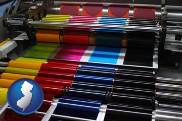 an offset printing press with CMYK ink rollers - with New Jersey icon