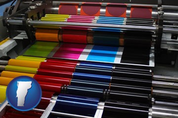 an offset printing press with CMYK ink rollers - with Vermont icon