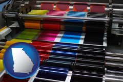 georgia map icon and an offset printing press with CMYK ink rollers