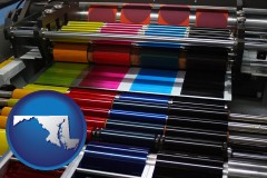 maryland map icon and an offset printing press with CMYK ink rollers