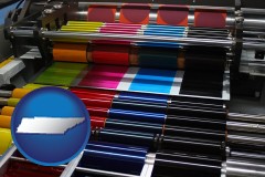 tennessee map icon and an offset printing press with CMYK ink rollers